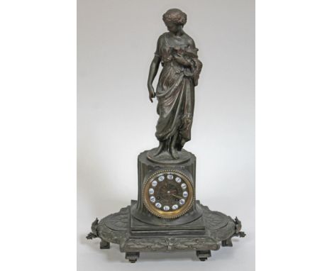 A French spelter mantel clock, height 50cm.  