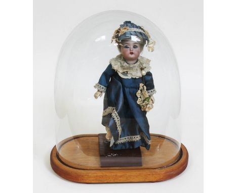 A Kammer & Rhienhardt bisque headed doll with sleepy eyes, composition body and limbs, marked 'Halbig K star R 30', length 28