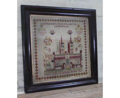 A large Victorian cathedral sampler "A Representation of Lincon Cathadral Mary Ann Crabtree Work 1860", 66cm x 66cm, glazed a