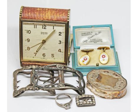 A mixed lot comprising an alarm clock, three white metal buckles, a pair of fire service cufflinks, a ring marked 925 and a h