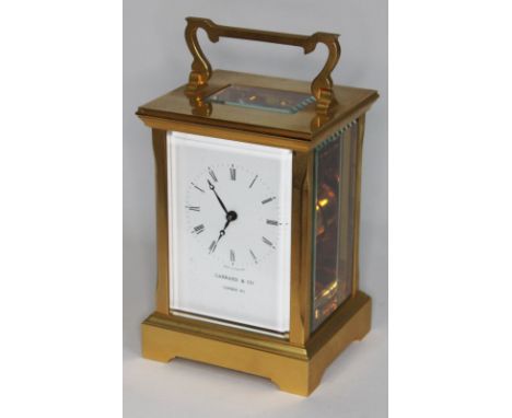 A Garrard &amp; Co gilt brass carriage clock, height 17cm.  Condition - without key, appears in working order (however not so