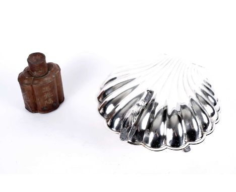 A silver plate shell-shaped lidded tureen, with acanthus handle raised on lion paw feet, together with a Chinese lead tea cad