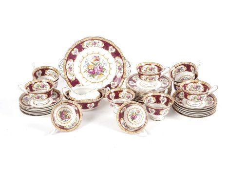 A Royal Albert 'Lady Hamilton' part tea set, comprising: twelve tea cups, twelve saucers, eleven sandwich plates, cream jug, 