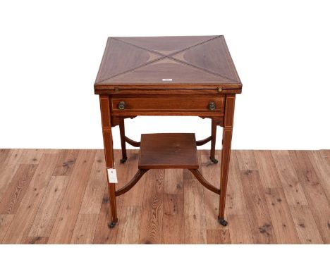 An Edwardian inlaid mahogany and satinwood banded envelope card table, with the swivel action top opening to reveal a green b