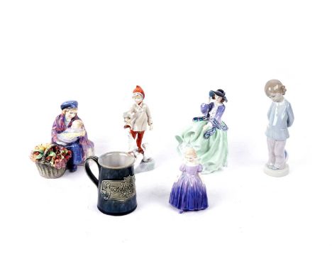 A collection of ceramic figures, comprising: Royal Doulton figures ‘Curly Knob’ HN1627, ‘Top ‘o’ the Hill’ HN 1833 and ‘Marie