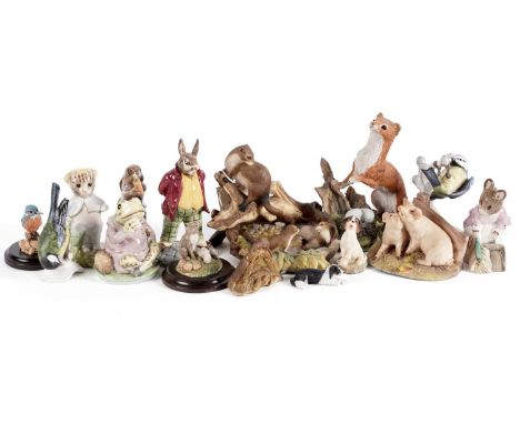 A collection of cast resin and ceramic figures, to include: two Beswick Beatrix Potter figures, ‘Tom Kitten’, ‘Hunca Munca’ a