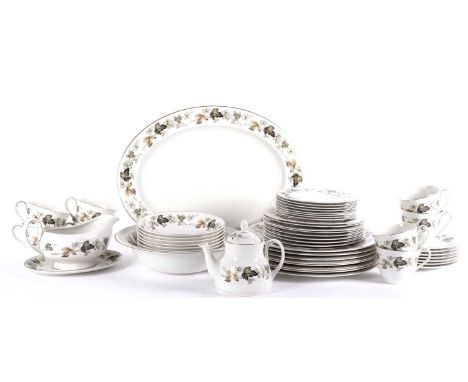 A Royal Doulton ‘Larchmont’ tea and dinner service, comprising: teacups, saucers and side plates, dinner plates, dessert bowl