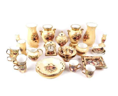A collection of Aynsley ‘Orchard Gold’ decorative ceramic wares, including: a limited edition pair of vases ‘Buckingham Centr