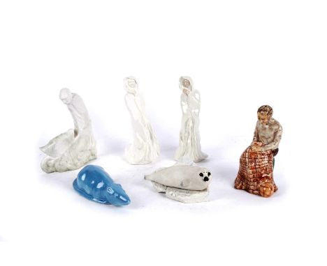 Shebeg Pottery, Isle of Man: a collection of ceramic figural studies, to include: a seal; a fisherman tending his net; a rat;