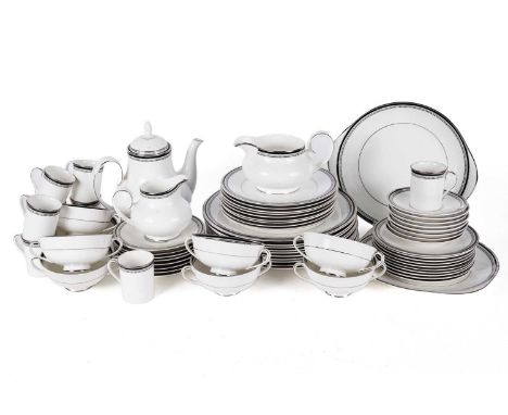 A Royal Doulton ‘Sarabande’ dinner and coffee service, comprising: dinner and side plates, soup bowls and saucers, coffee pot