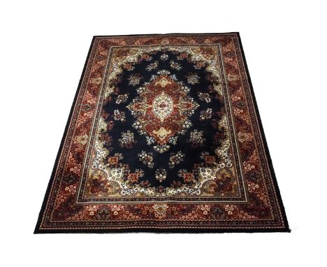 A Persian style machine made Kashmir carpet, with floral decoration, 288 x 203cms.
