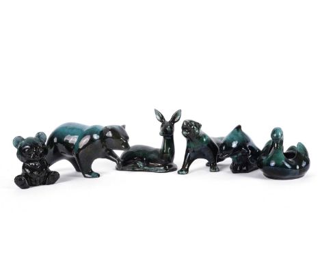 A collection of Blue Mountain ceramic animal figures, comprising: bears, a swan, a dolphin, a deer, and a tiger. (6)