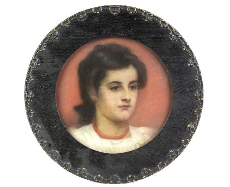 M E Kindon (British, c. 1855-c. 1925), shoulder length portrait of a young girl, signed, pastels, 29cm diameter, in circular 