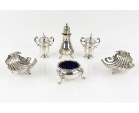 George V pair of silver shell salts, by Goldsmiths & Silversmiths Co Ltd, London 1911, 9.5 cm wide, together with a pair of s