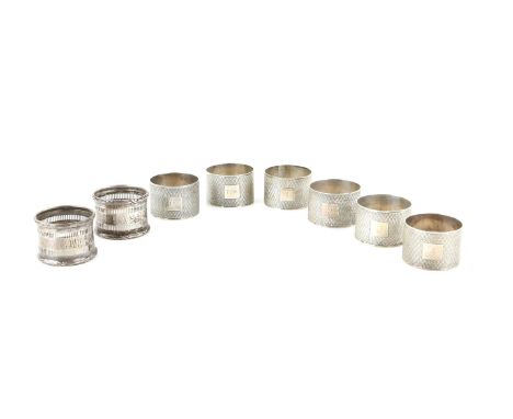 Modern silver set of six napkin rings, by Viner's Ltd, Sheffield 1960, with engine turned decoration and numbered cartouche, 