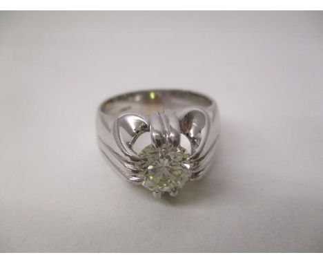 An 18ct white gold gents, single stone, brilliant cut diamond ring, approximately 1.6ct, in a polished shank, size Q/R, 12.8g