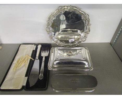 A quantity of silver plated items to include a circular salver on three cast feet, fish knife and fork serving set, cased and