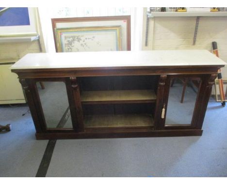 A Victorian rosewood side cabinet with a mottled white marble top, over a curved frieze, height adjustable and fixed shelves,