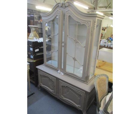 A modern French grey painted display cabinet with twin glazed doors and cupboards below standing on short cabriole legs 76 3/