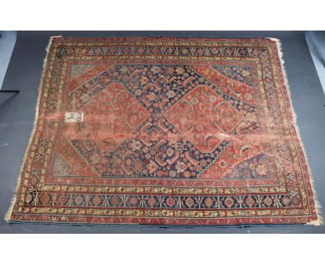Four various&nbsp;Persian rugs (all heavily worn); &amp; A japanned-metal travelling trunk with hinged lift-lid &amp; wrought