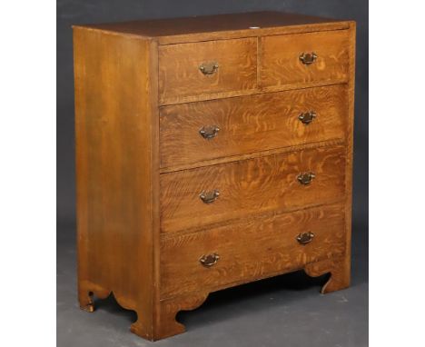 A Georgian-style oak chest fitted two short &amp; three long drawers with brass swing handles, &amp; on o-gee bracket feet, 9