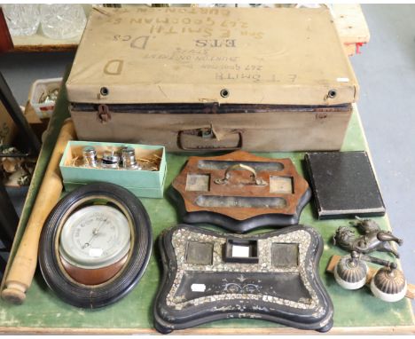 A japanned-metal travelling trunk with a hinged lift-lid &amp; with canvas travelling case, 59cm wide; together with a wall b