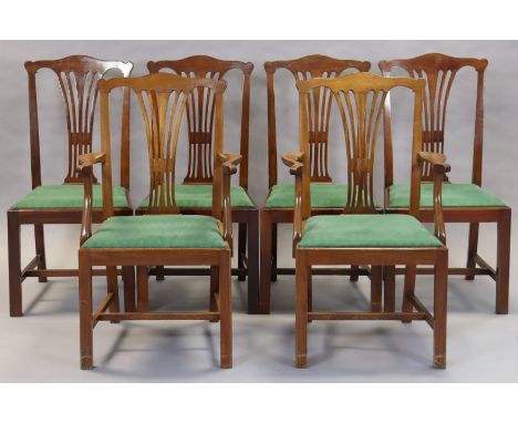 A set of six Chippendale-style mahogany dining chairs, including a pair of elbow chairs, with pierced splat backs, padded dro