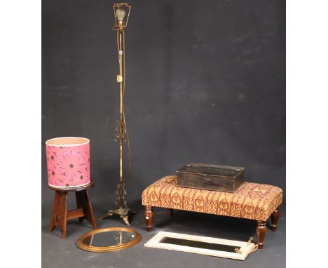 A brass standard lamp on a triform base; together with two stools; &amp; two wall mirrors. 