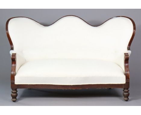 A Victorian mahogany-frame sofa with shaped back, scroll arms and turned fluted feet, upholstered in plain calico, 164cm wide