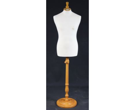 Another cream fabric-covered mannequin on a turned beech stand, 176cm high.
