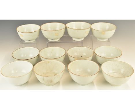 Twelve&nbsp;Chinese Kangxi period pedestal bowls with ivory / celadon glaze, from the Vung Tau Cargo, some with original Chri