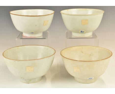 Four&nbsp;Chinese Kangxi period pedestal bowls with ivory / celadon glaze, from the Vung Tau Cargo, some with original Christ