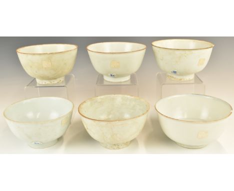 Six&nbsp;Chinese Kangxi period pedestal bowls with ivory / celadon glaze, from the Vung Tau Cargo, some with original Christi