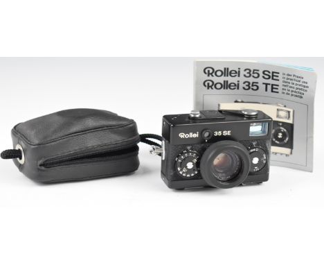 Rollei 35SE 35mm camera, in original pouch with instruction manual