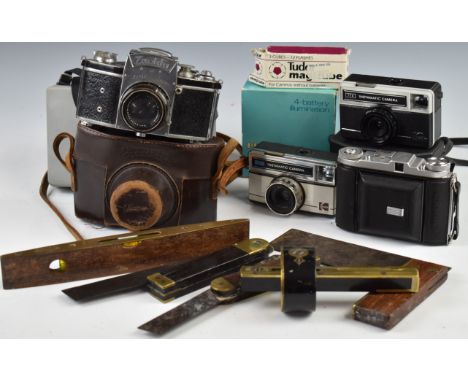 Cameras and woodworking tools including Exakta II 35mm SLR with 1:2 f=5.8cm lens, Balda folding camera, Kodak 277X, Polaroid 