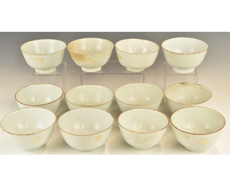 Twelve&nbsp;Chinese Kangxi period pedestal bowls with ivory / celadon glaze, from the Vung Tau Cargo, some with original Chri