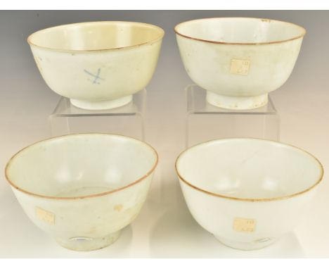 Four&nbsp;Chinese Kangxi period pedestal bowls with ivory / celadon glaze, from the Vung Tau Cargo, some with original Christ