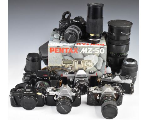 Eight 35mm SLR cameras comprising Fujica AZ-1 with 1:2.2 55m lens, Praktica LLC with 1.8/50 lens, Minolta Dynax 3xi with 35-7