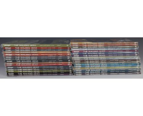 The Walking Dead graphic novel volumes 1-32 by Image Comics together with a signed print by artist Charlie Adlard.