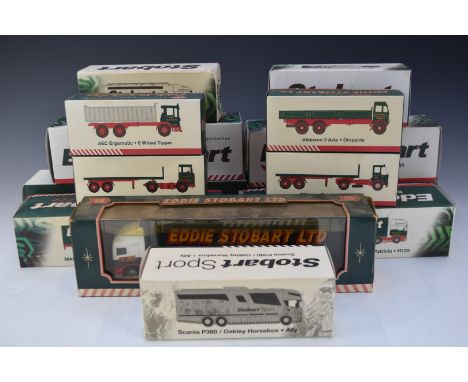 Fourteen Eddie Stobart Ltd diecast model lorries comprising 13 Atlas Editions and one Corgi, all in original boxes with addit