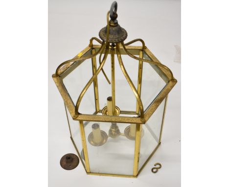 Heavy brass octagonal glazed electric light, diameter 45 x height 70cm