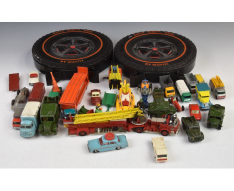 A collection of Corgi, Matchbox, Dinky and similar diecast model vehicles including Beatles Yellow Submarine, Drive Safely on