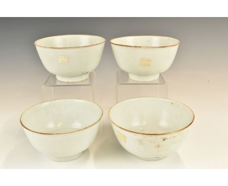 Four&nbsp;Chinese Kangxi period pedestal bowls with ivory / celadon glaze, from the Vung Tau Cargo, some with original Christ