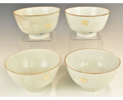 Four&nbsp;Chinese Kangxi period pedestal bowls with ivory / celadon glaze, from the Vung Tau Cargo, some with original Christ