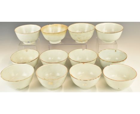 Twelve&nbsp;Chinese Kangxi period pedestal bowls with ivory / celadon glaze, from the Vung Tau Cargo, some with original Chri