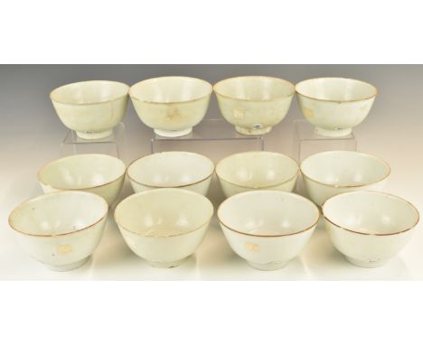 Twelve&nbsp;Chinese Kangxi period pedestal bowls with ivory / celadon glaze, from the Vung Tau Cargo, some with original Chri