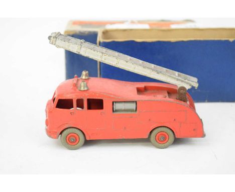 Dinky die-cast toy fire engine, No 555, in original box (play worn condition)