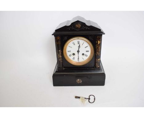 Late 19th century black slate mantel clock, the dial flanked by two columns, complete with key, 26cm high