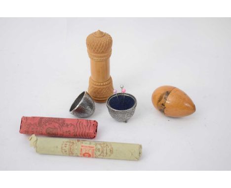 Small plastic bag containing wooden egg shaped thimble holder with view of Battle Abbey, silver metal pin cushion, quantity o