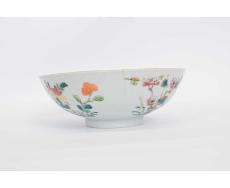 Chinese porcelain bowl decorated in polychrome and famille rose with floral designs, seal mark for Guangxu, circa late 19th c